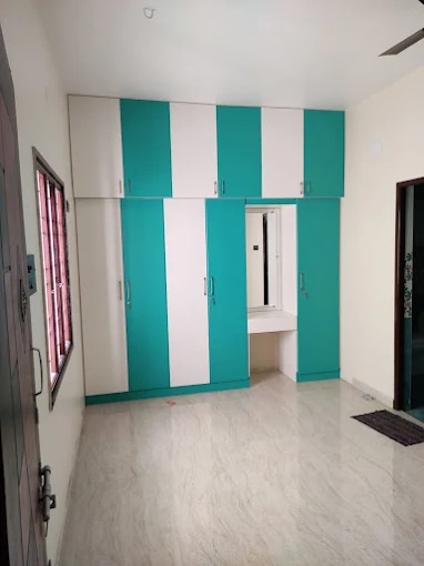 Wardrobe and loft interior designed by House Decors in Chennai