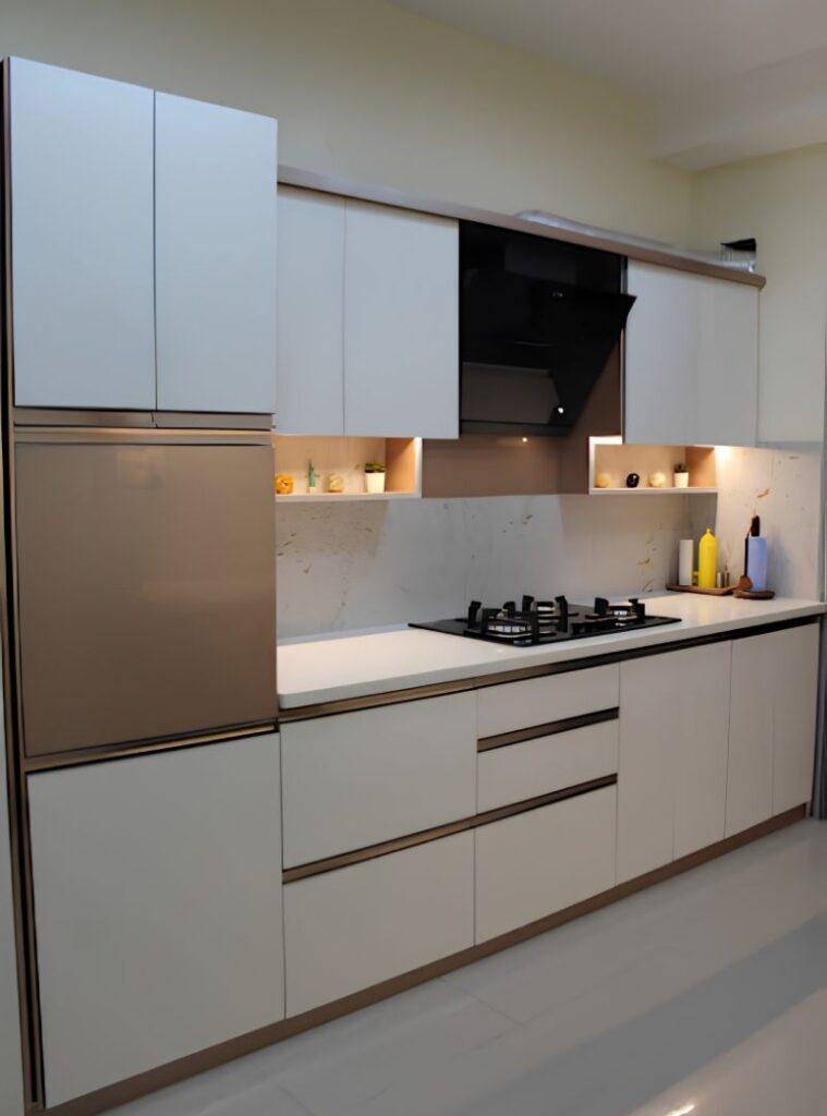 White and wood-grain modular kitchen with tall storage unit by House Decors, Chennai