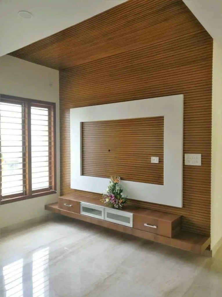TV unit with wooden slat wall and white frame, House Decors, Chennai