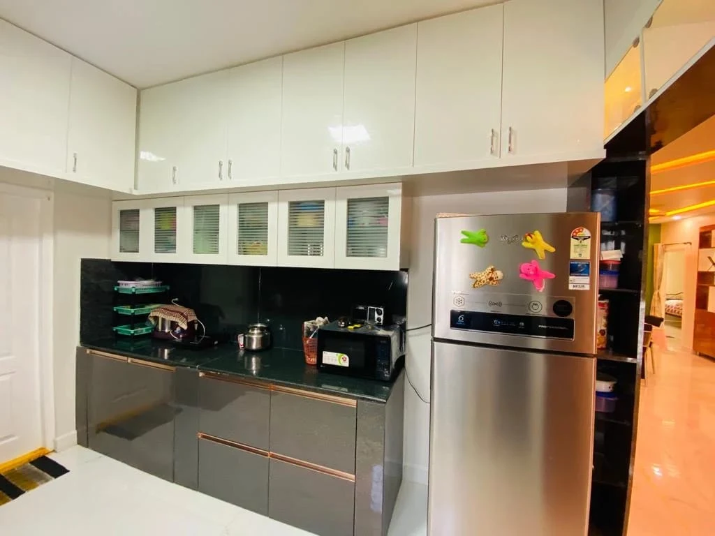 Kitchen interior by House Decors in Chennai